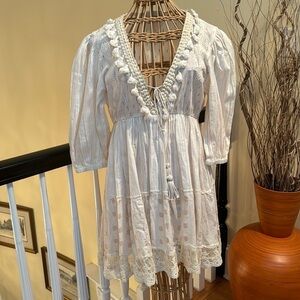 Z&L Made with Love cream colored dress with gold and tassels